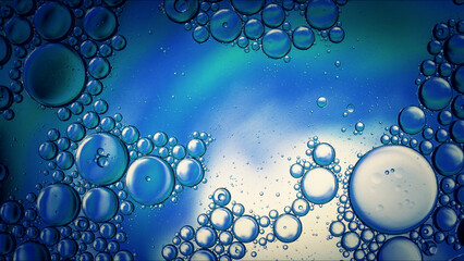 Abstract Colorful Food Oil Drops Bubbles and spheres Flowing on Water Surface