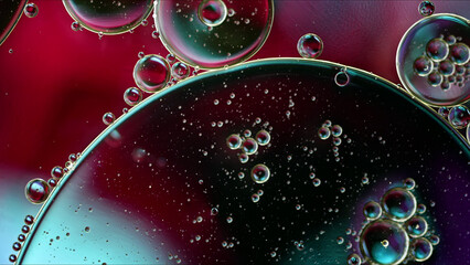 Abstract Colorful Food Oil Drops Bubbles and spheres Flowing on Water Surface - 687485063