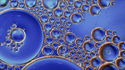 Abstract Colorful Food Oil Drops Bubbles and spheres Flowing on Water Surface - 687485075