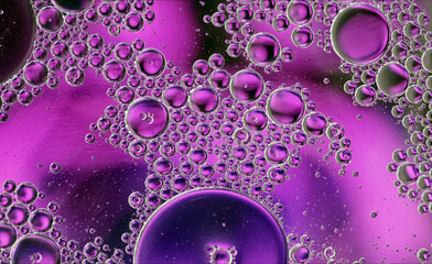 Abstract Colorful Food Oil Drops Bubbles and spheres Flowing on Water Surface - 687485218