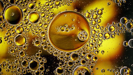 Abstract Colorful Food Oil Drops Bubbles and spheres Flowing on Water Surface - 687485224