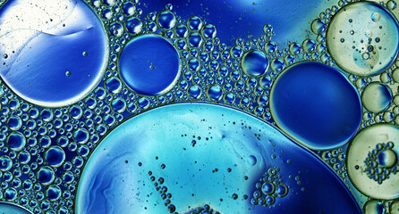 Abstract Colorful Food Oil Drops Bubbles and spheres Flowing on Water Surface - 687485282