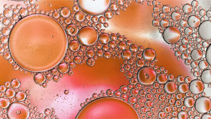 Abstract Colorful Food Oil Drops Bubbles and spheres Flowing on Water Surface - 687485288