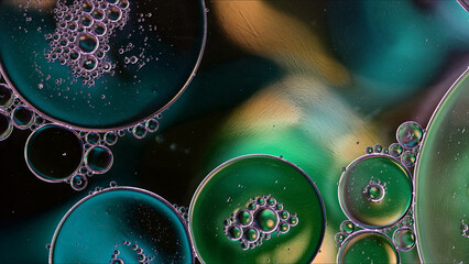 Abstract Colorful Food Oil Drops Bubbles and spheres Flowing on Water Surface - 687485405