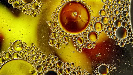 Abstract Colorful Food Oil Drops Bubbles and spheres Flowing on Water Surface - 687485406