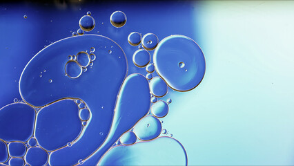 Abstract Colorful Food Oil Drops Bubbles and spheres Flowing on Water Surface - 687485422