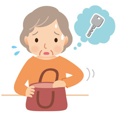 鍵を探すシニア女性　高齢者　介護　認知症