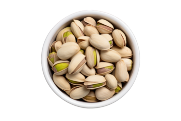 vu de dessus d'un bol rempli de pistaches salées