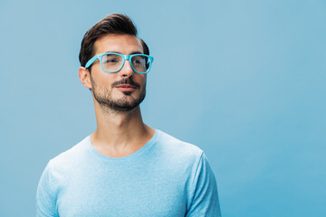 Man style attractive blue portrait smile fashion lifestyle beard modern t-shirt trendy glasses...