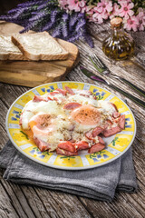 Fried eggs with sausage.