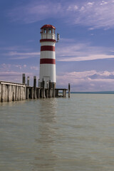 Lighthouse view at dramatic sunset, Neusiedler See,  Lake Neusiedl in Burgenland