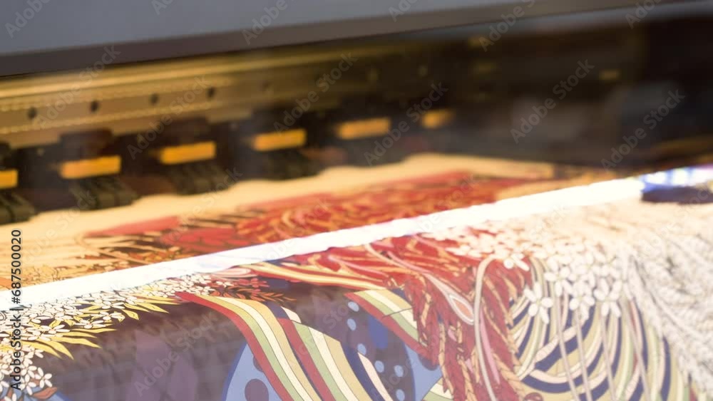 Poster large inkjet printer working, industrial printer, plotter head slides over the surface of the paper 