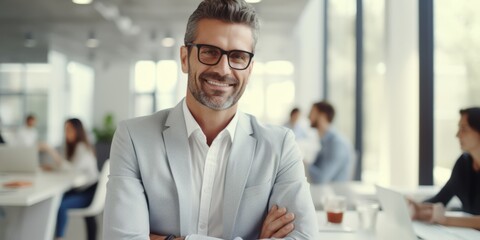 Fototapeta premium Confident Businessman in a Stylish Suit and Glasses