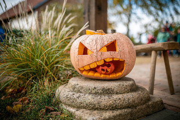 Jack O Lantern carved pumpin in autumn, kids decoration for Halloween