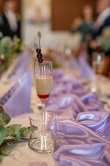 Purple satin wedding table decoration