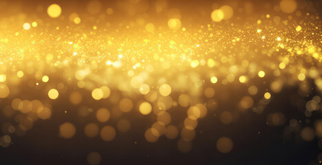 Particles of yellow glow on a bokeh background. Contemporary glitter opulent golden sparkles. Blurred, defocused, abstract background for Christmas.