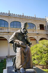 Sculpture of Alonso de Fonseca III, founder of the Compostela university, in the cloister of the 'Pazo de Fonseca' Santiago de Compostela, Galicia, Spain 10092023