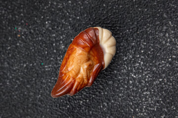 candy seashells chocolate sweet dessert eating cooking appetizer meal food snack on the table copy space food background rustic top view