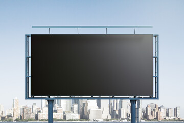 Blank black horizontal billboard on cityscape background, front view. Mockup, advertising concept