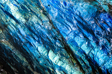 Labradorite blue specimen close-up macro detail semi-precious gemstone texture uncut, unpolished...