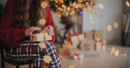 Woman Preparing Christmas Gift For Xmas Holidays