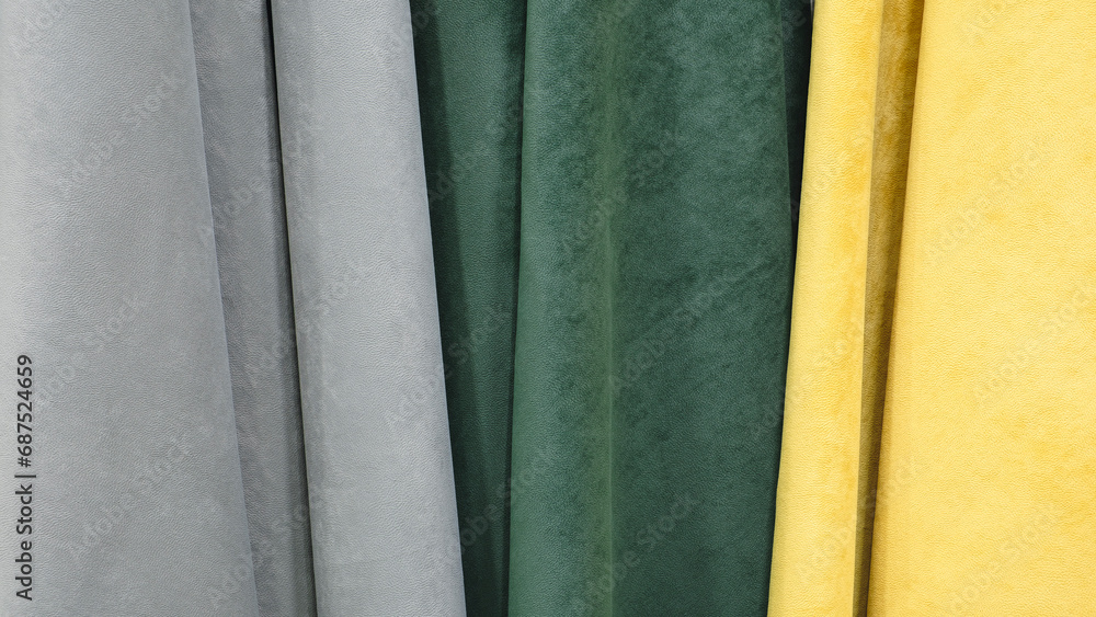 Poster mix colorful hanging vertical stripe textile, fabrics, cloths on the rack. texture of multicolored f