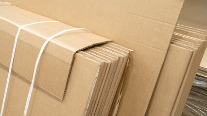 Cardboard paper sheets ready for packaging in industrial furniture factory as page, template or web...