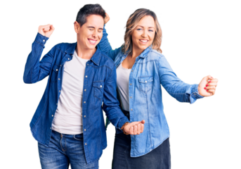 Couple of women wearing casual clothes dancing happy and cheerful, smiling moving casual and confident listening to music