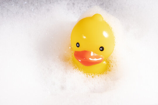 Floating rubber duck, bath relaxation, playful bath accessory, yellow ducky