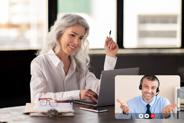 Mature woman entrepreneur have video chat with business consultant