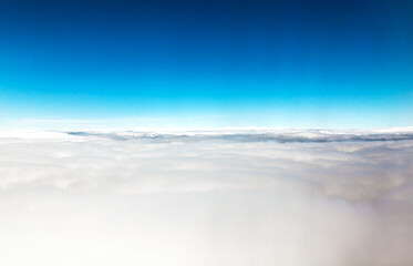 View from the plane at an altitude of 10,000 meters. Land from the height of a flying plane.