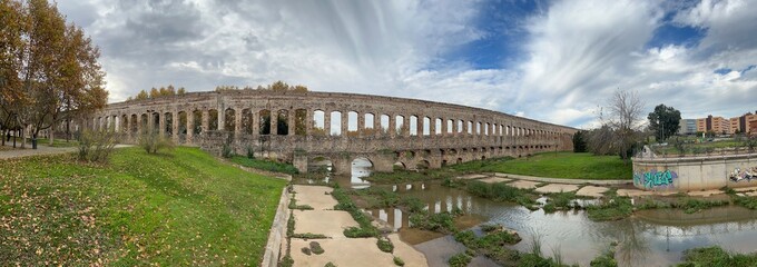 old Roman aqueduct in Merida Spain - obrazy, fototapety, plakaty