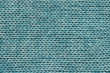 Turquoise textured Knitted background.	
