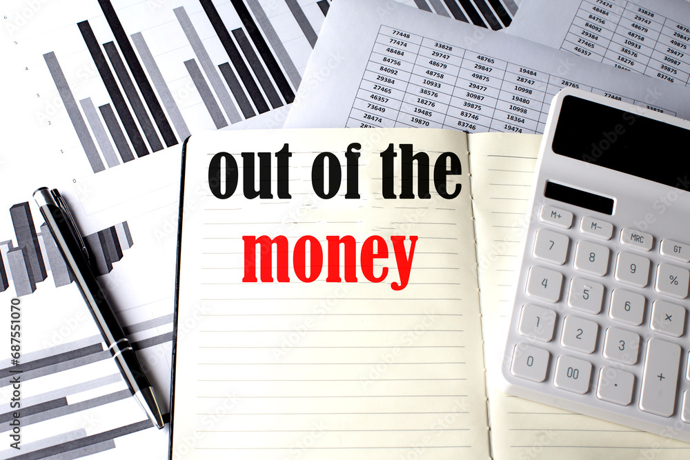 Poster out of the money text written on a notebook on chart and diagram