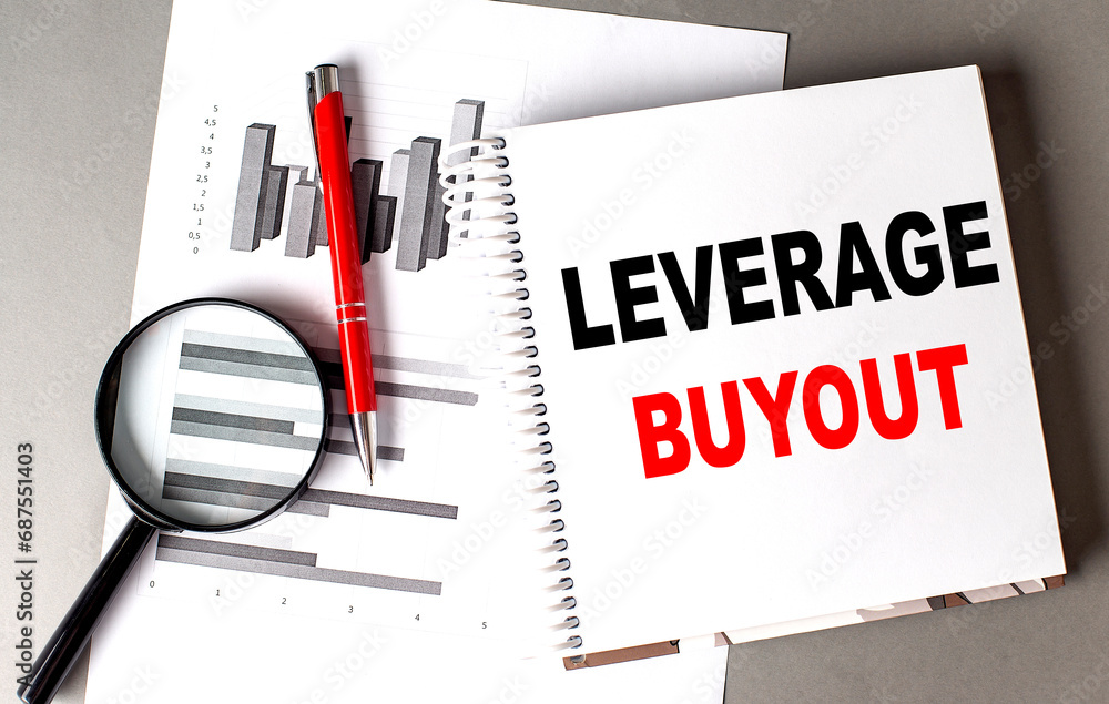 Poster leverage buyout text written on notebook with chart
