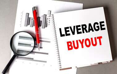 LEVERAGE BUYOUT text written on notebook with chart