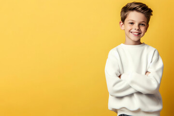 Obraz na płótnie Canvas Happy boy wearing white sweatshirt mockup at yellow background. ai generative