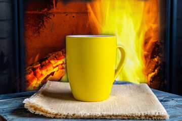 Cozy fireplace, winter holidays and coffee mug