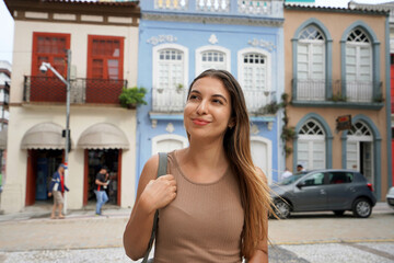 Portrait of beautiful traveler woman visiting the historic center of Florianopolis, Santa Catarina,...