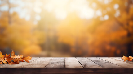 Naklejka na ściany i meble Empty wooden table with autumn for product display with blur background of autumn forest. with a country outdoor theme,Template mock up for display of product