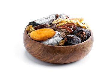 Dried fruits in wooden bowl isolated on white