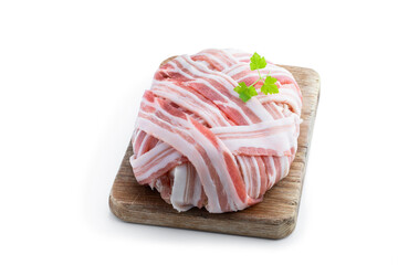 Raw italian bacon wrapped meatloaf isolated on white