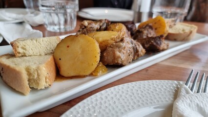 meat  potatoes bread  sauce food greek