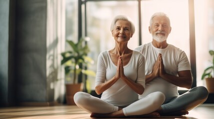 active elderly couple perform yoga together, practicing meditate, balance, recreation, relaxation, calm, good health, happy, relax, healthy lifestyle, reduce stress - obrazy, fototapety, plakaty