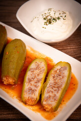 RECIPE FOR LEBANESE-STYLE MINI ZUCCHINI STUFFED WITH RICE AND BEEF IN A TOMATO SAUCE, High quality photo