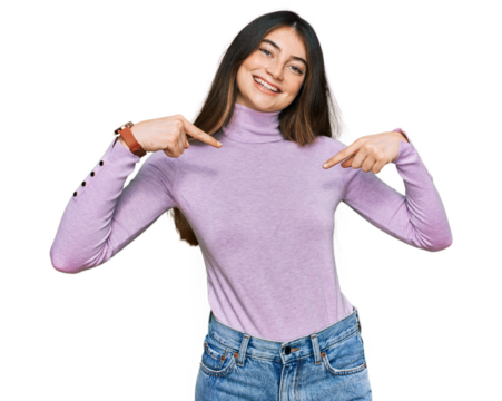 Young beautiful teen girl wearing turtleneck sweater looking confident with smile on face, pointing oneself with fingers proud and happy.