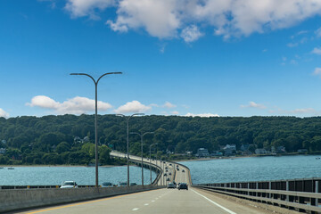 Drivers’ perspective view over the road of the I-287 leaving the twin cable-stayed Tappan Zee...