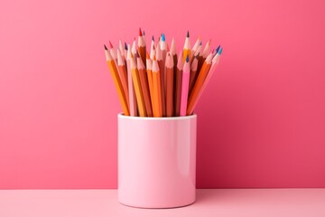Pencil and pencils on colour background in box - obrazy, fototapety, plakaty