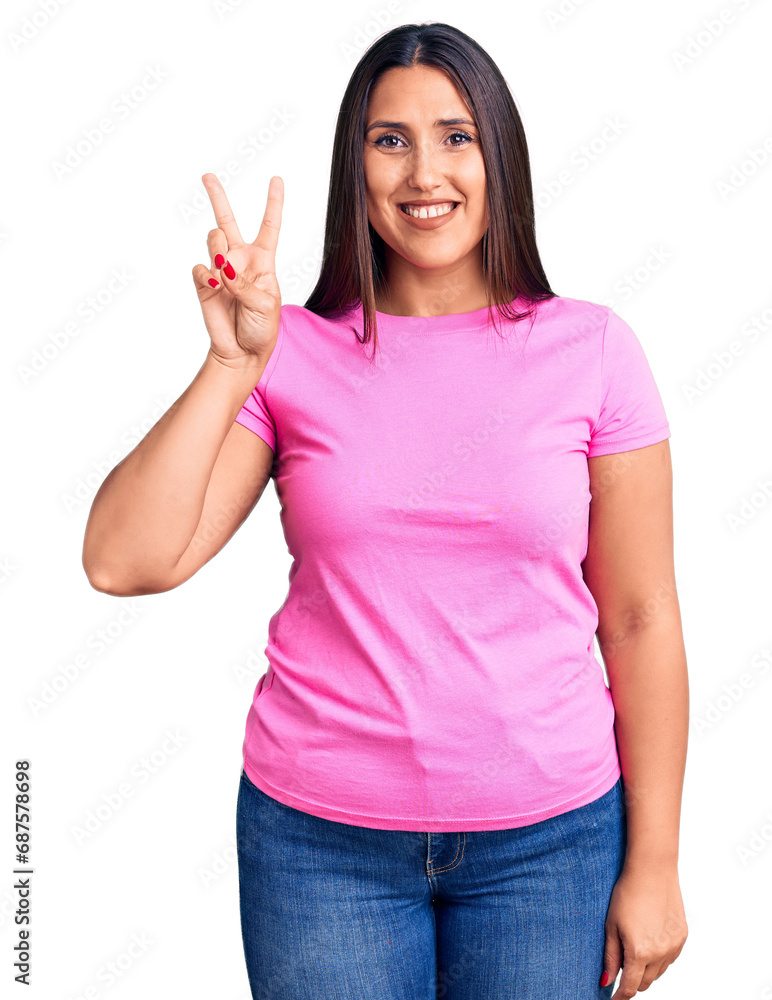 Poster young beautiful brunette woman wearing casual t-shirt smiling with happy face winking at the camera 