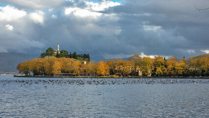 ioannina city in autumn season yellow warm colors by the lake greece